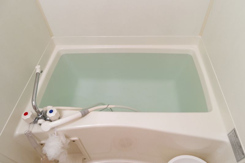 Refinished Tub with Fixtures